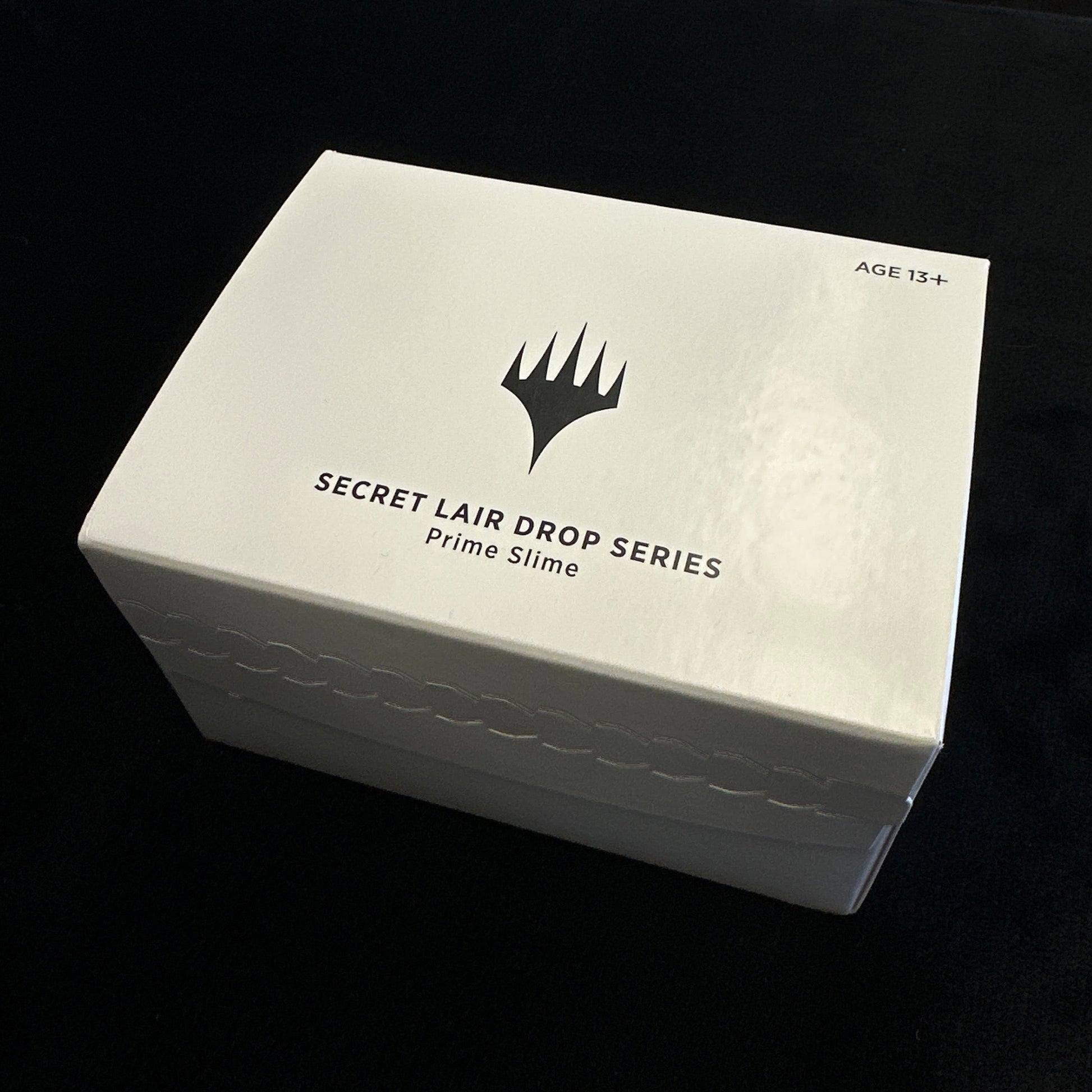 White box with 'Secret Lair Drop Series' MTG logo on a black background
