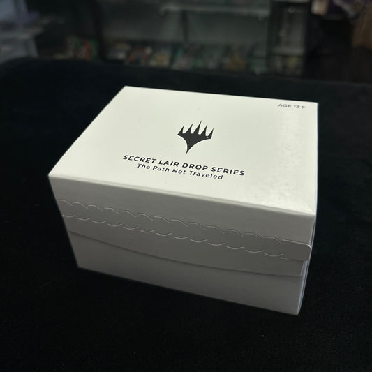 White box with mtg logo and text on a black background