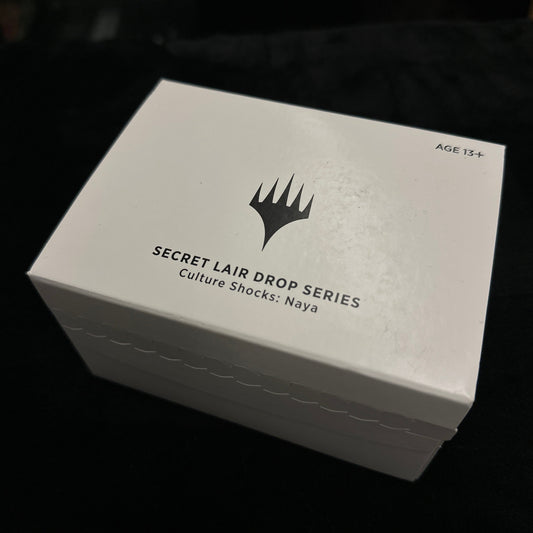 White box with black text and mtg logo on a dark background