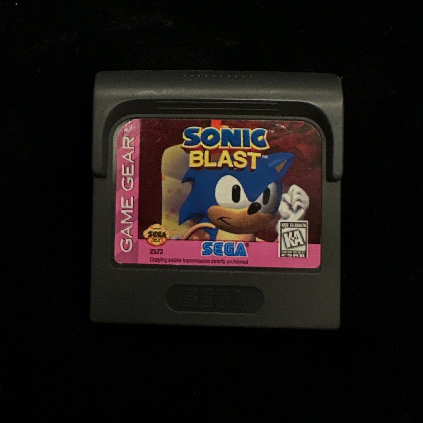 Sonic Blast game cartridge on a black background