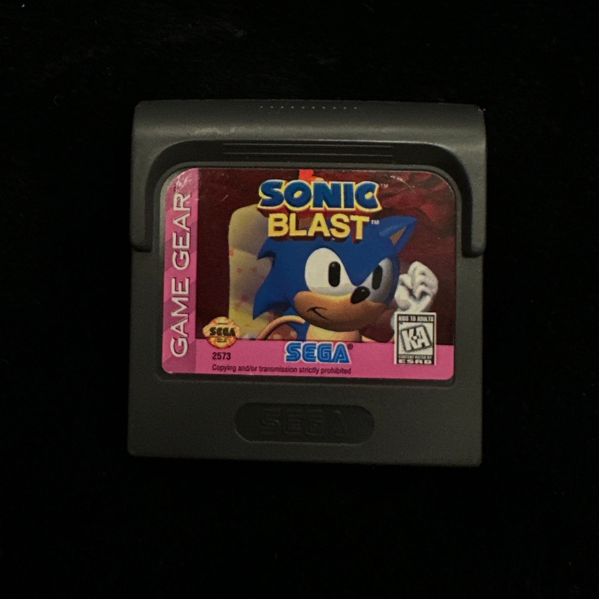 Sonic Blast game cartridge on a black background