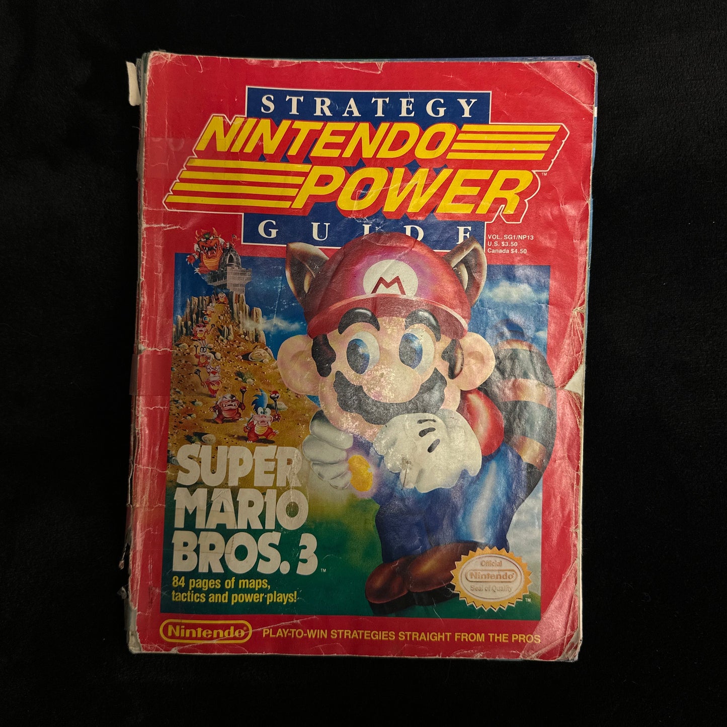 Super Mario Bros. 3 game box on a black surface