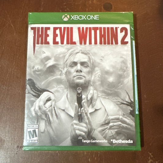 Game case for 'The Evil Within 2’ on a wooden surface