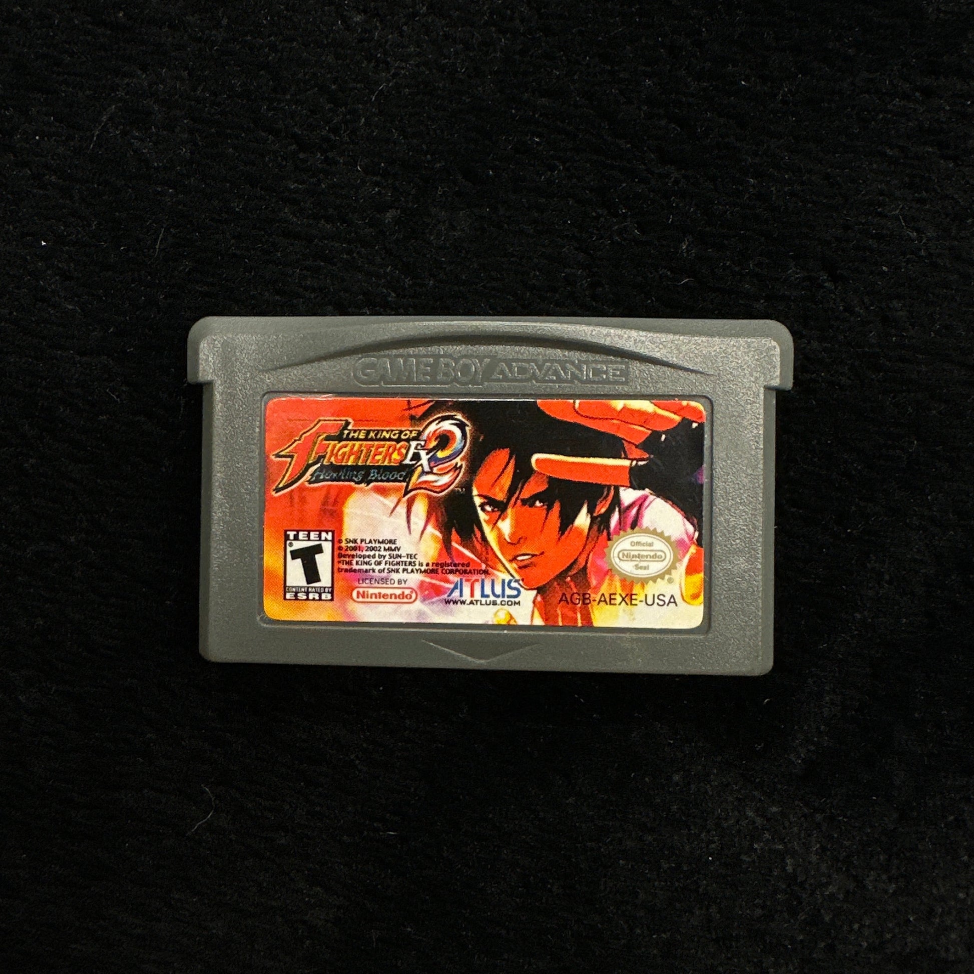 Game cartridge on a black background