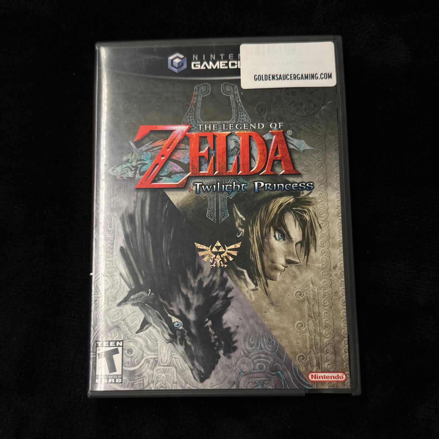 Game cartridge of 'The Legend of Zelda' on a dark background