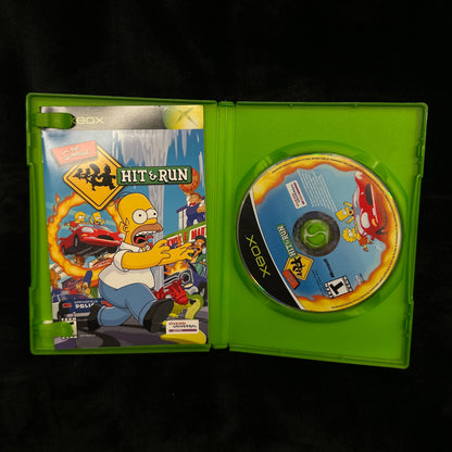 Xbox game disc and case on a black background