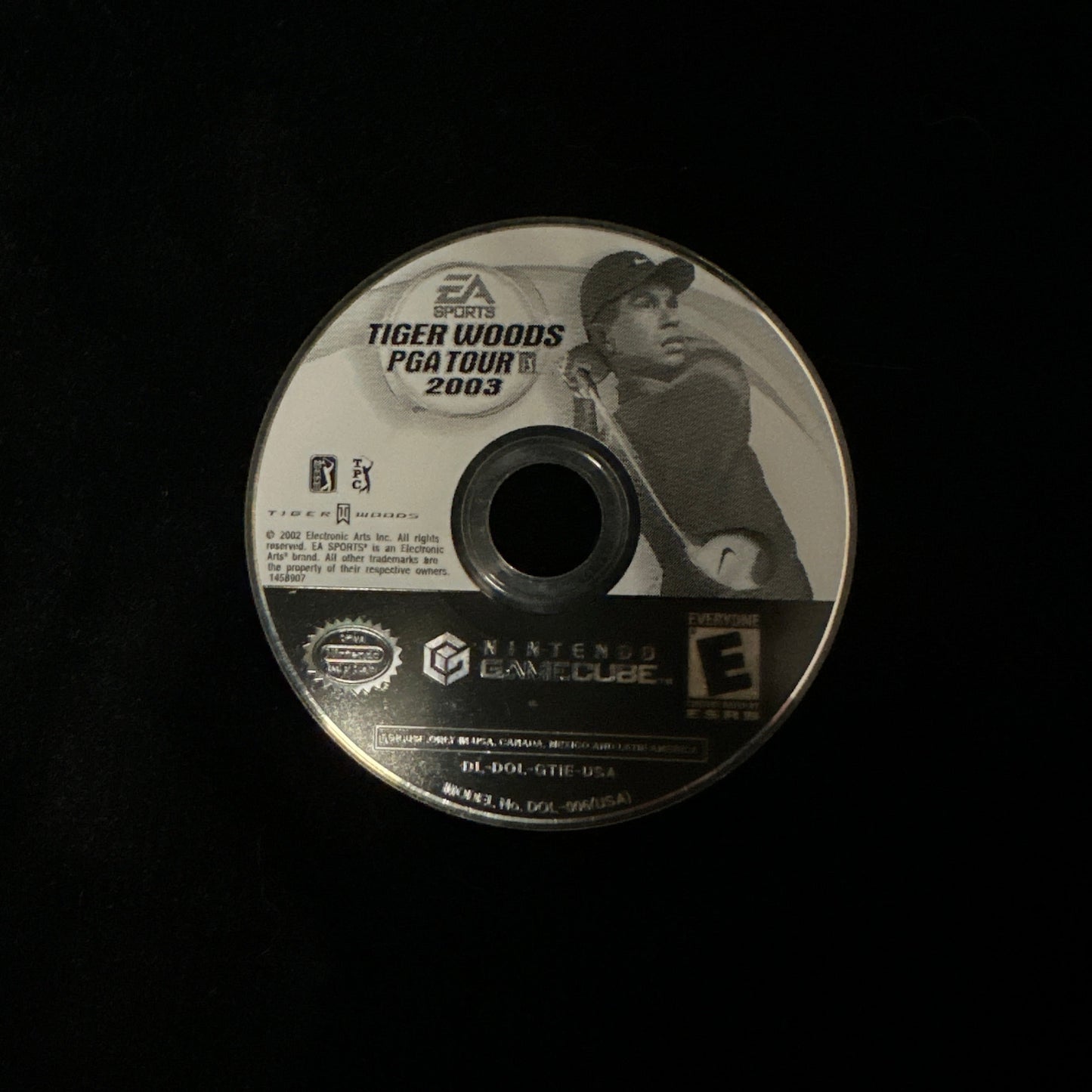 A single video game disc for Tiger Woods PGA Tour 2003 on GameCube, shown against a solid black background.