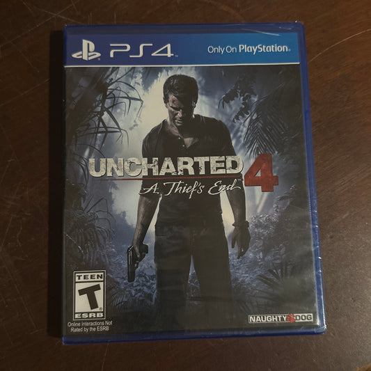Uncharted 4 game case on a wooden surface
