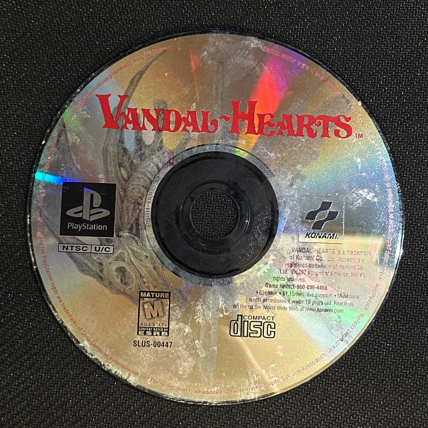 CD with 'Vandal Hearts' branding on a black background