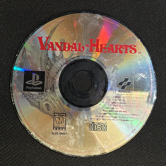 CD with 'Vandal Hearts' branding on a black background