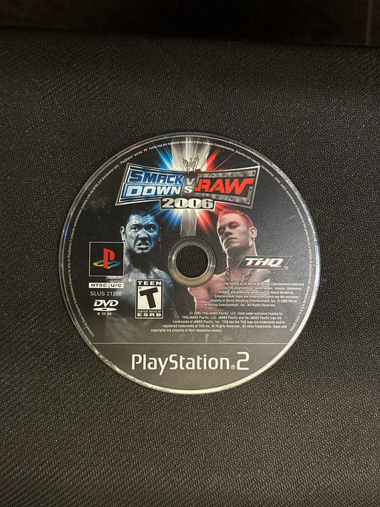 Wrestling game disc for PlayStation 2 on a textured black surface