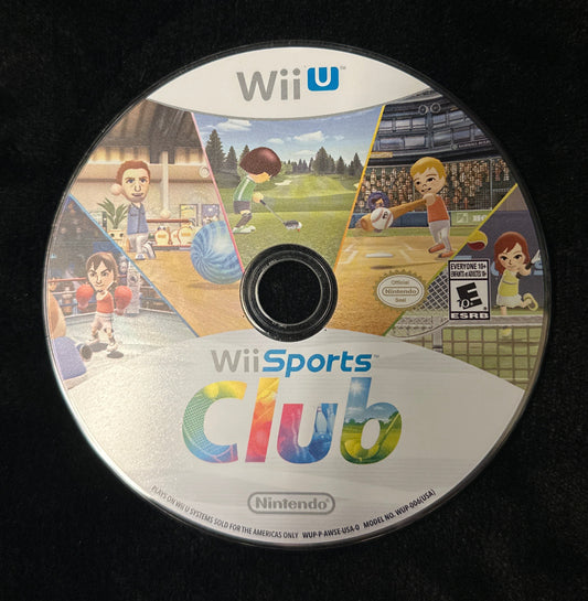 A Wii Sports Club video game disc for the Nintendo Wii U, resting on a black fabric surface. The disc features colorful illustrations of characters playing sports and the game title 'Wii Sports Club' with the Nintendo logo at the bottom.