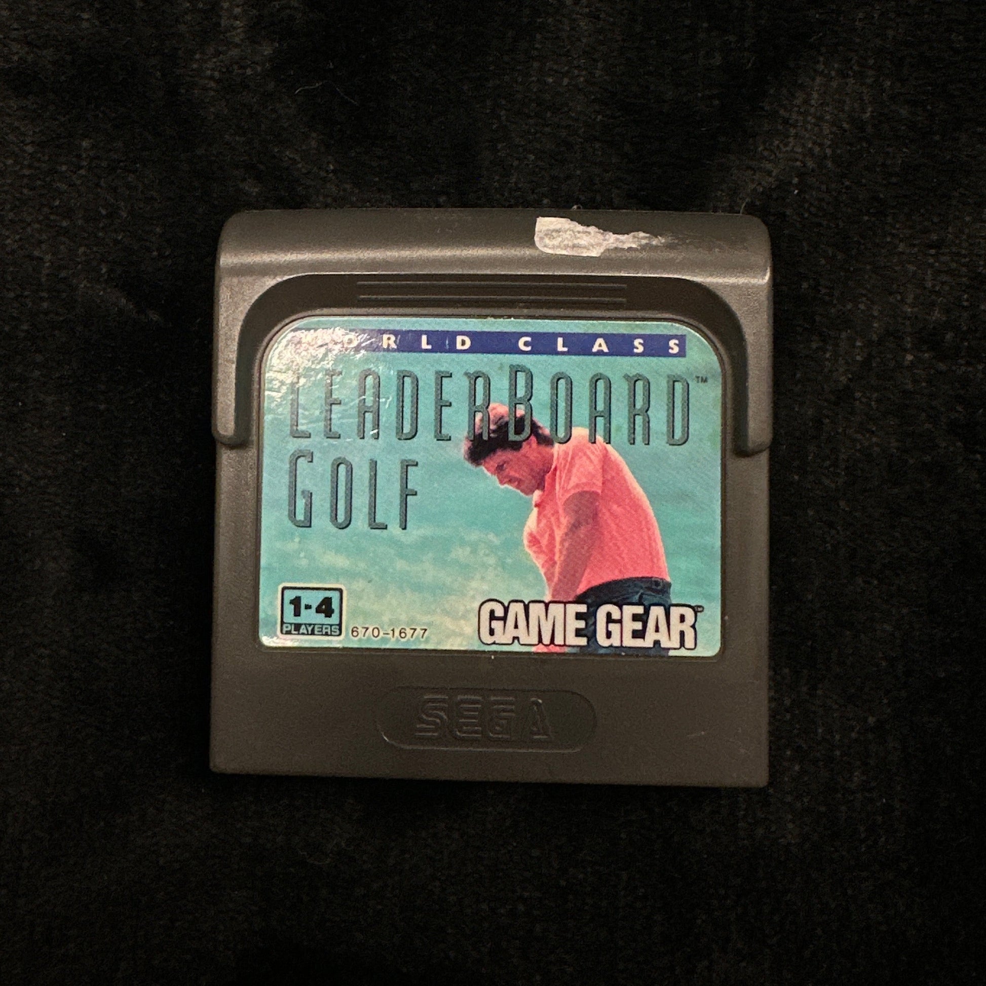 Game Gear cartridge on a dark surface